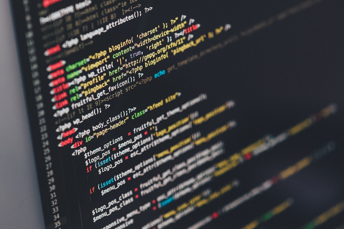 Code on a monitor in a dark room